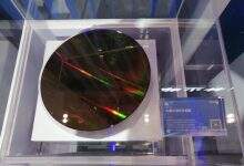 紫光集团首次公开展示长江存储第二代64层3D NAND Wafer-存储在线